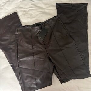 NWT Women’s Large high waisted brown vegan leather. 
High rise & Flare Bottom.
